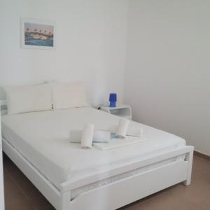 Cama ou camas em um quarto em Chaniotis Studios