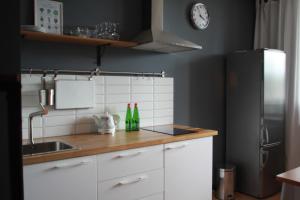 A kitchen or kitchenette at Bonbonche Apartaments