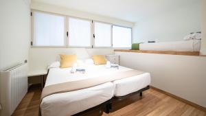 Cama o camas de una habitación en Concha Beach II - SSHousing