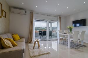 Χώρος καθιστικού στο Villa Apartments AA 1