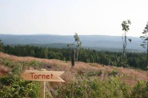 una señal que lee Ranger en una colina en Mieps Huset Dalarna Holiday en Kullen