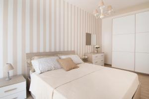 Un pat sau paturi într-o cameră la Apulianstay-La Dimora di Sofia