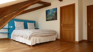 Postel nebo postele na pokoji v ubytování B&B Château de Preuil