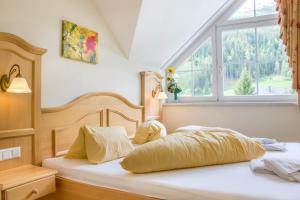 Postel nebo postele na pokoji v ubytování Hotel Gell