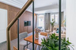 Telewizja i/lub zestaw kina domowego w obiekcie Livemalaga Centro Suites