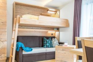 Rúm í herbergi á Appartements Hotel Gell