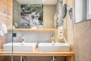 Baðherbergi á Appartements Hotel Gell