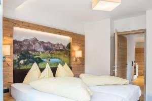 Rúm í herbergi á Appartements Hotel Gell