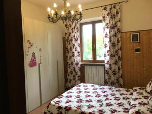 Postel nebo postele na pokoji v ubytování Casa Fabbrichina