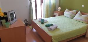 Postel nebo postele na pokoji v ubytování Apartments Lans