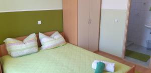 Postel nebo postele na pokoji v ubytování Apartments Lans
