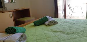 Postel nebo postele na pokoji v ubytování Apartments Lans