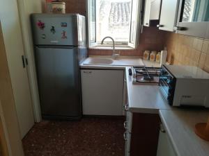 Kuchyň nebo kuchyňský kout v ubytování Il terrazzo dei nonni