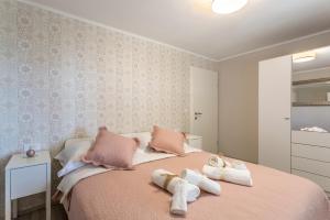 Postel nebo postele na pokoji v ubytování Luxury Apartment Beyond
