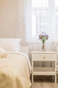 Postel nebo postele na pokoji v ubytování Luxury Apartment Beyond