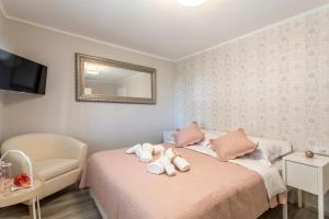 Postel nebo postele na pokoji v ubytování Luxury Apartment Beyond