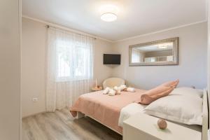 Postel nebo postele na pokoji v ubytování Luxury Apartment Beyond