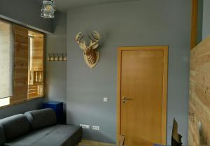 Uma área de estar em Mediterranium Apartments