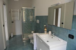 Kúpeľňa v ubytovaní Casa del Porto al Borgo Marinari + 5 fotografií