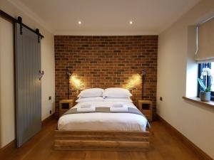 Cama o camas de una habitación en Manor House Inn