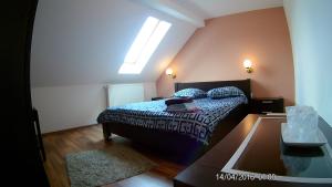 Postel nebo postele na pokoji v ubytování Hotel Marasesti