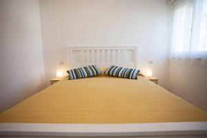 Postel nebo postele na pokoji v ubytování Residence Mama