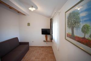 TV a/nebo společenská místnost v ubytování Residence Mama