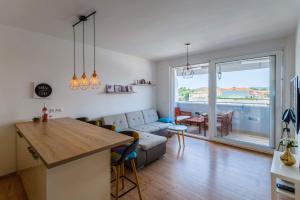 Posezení v ubytování Apartment Skadenca