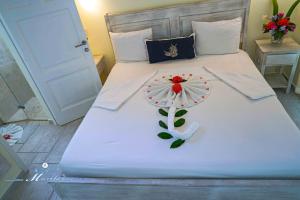 Voodi või voodid majutusasutuse Hotel Residence Marilar toas