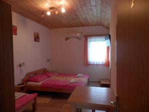 Postel nebo postele na pokoji v ubytování Guesthouse Matija