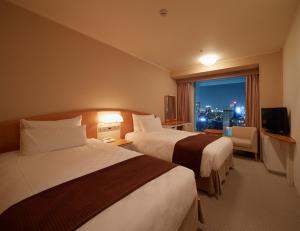 Katil atau katil-katil dalam bilik di Shinagawa Prince Hotel