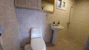 Koupelna v ubytování Sohyundang Guesthouse