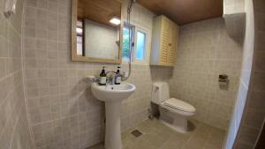 Koupelna v ubytování Sohyundang Guesthouse