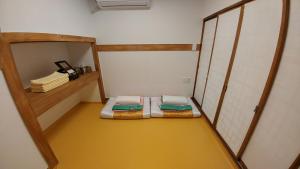 Krevet ili kreveti u jedinici u objektu Sohyundang Guesthouse