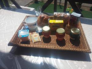 a tray of food and drinks on a table at Sonia Studios in Nees Kidonies