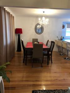 a dining room with a table and chairs at Cowes Holiday Haven - Property 1 in Cowes