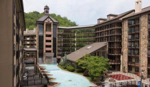 an aerial view of a hotel with a swimming pool at Heart of Gatlinburg, sleep 6 in Gatlinburg