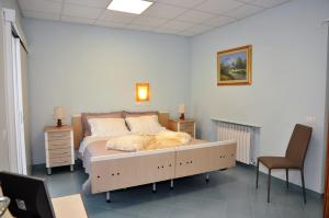 Postel nebo postele na pokoji v ubytování Albergo Rio