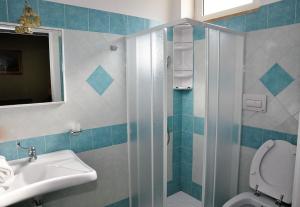 Koupelna v ubytování Albergo Rio