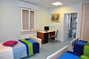 Postel nebo postele na pokoji v ubytování Albergo Rio