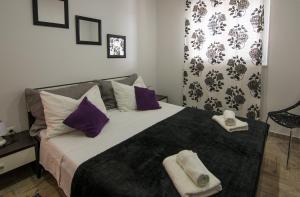 Llit o llits en una habitació de Srima Angel´s Apartments