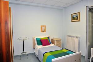 Postel nebo postele na pokoji v ubytování Albergo Rio