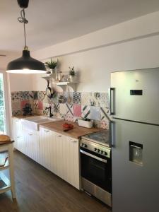 Kuchyň nebo kuchyňský kout v ubytování Apartments Duje