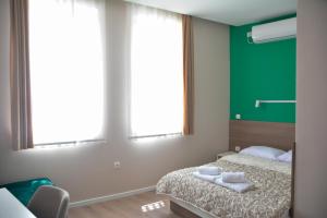 Voodi või voodid majutusasutuse Vila Nova toas