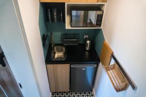 Kuchyň nebo kuchyňský kout v ubytování Redlowskie Klify Apartments