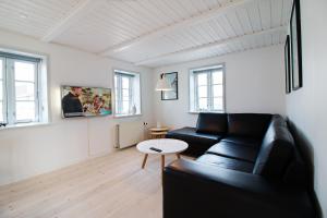 TV a/nebo společenská místnost v ubytování Hotel Litorina Appartements