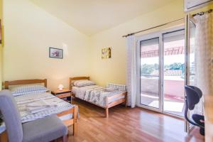 Postel nebo postele na pokoji v ubytování Apartment Salha
