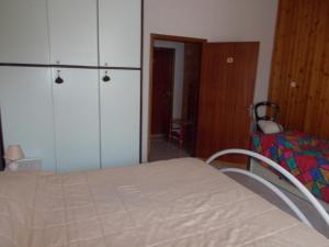 
A bed or beds in a room at La Vecchia Locanda
