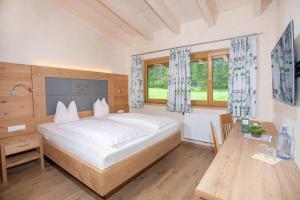 Letto o letti in una camera di Seehotel St Hubertus