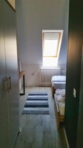 Postel nebo postele na pokoji v ubytování Arhiv Boutique House